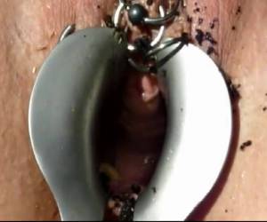 This is really fucked up torture, maggots in her pussy