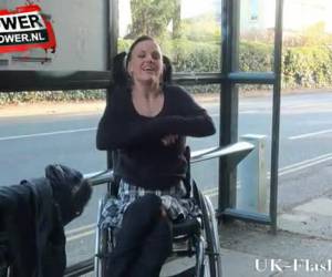 Flashing from her wheelchair