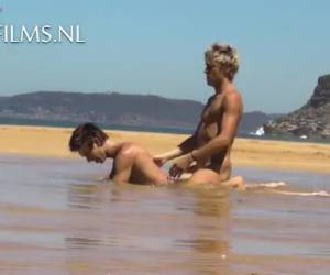Young twink couple has sex on deserted beach