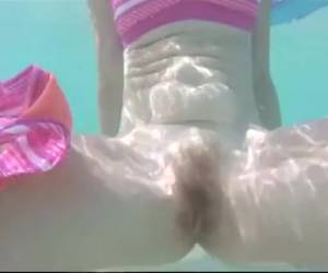 A sneaky underwater striptease