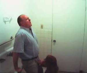 Teacher and secretary in a blowjob video filmed by a spy camera in the bathroom