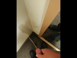 Risky public piss in store fitting room