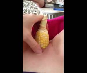No dildo at hand, but a corn on the cob