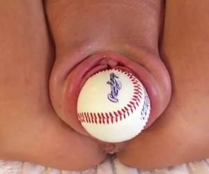 Swollen pussy squeezes baseball to the outside