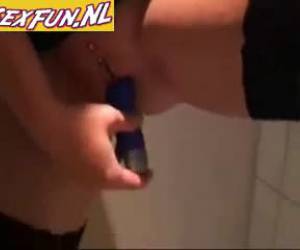 whiteh her sex toy to the toilet