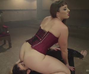 Gorgeous big bicep dominatrix wrestles, smothers dominates slaveboy