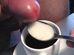 cumshot closeup uncut cock foreskin sperm jerkoff coffee sperm cookie
